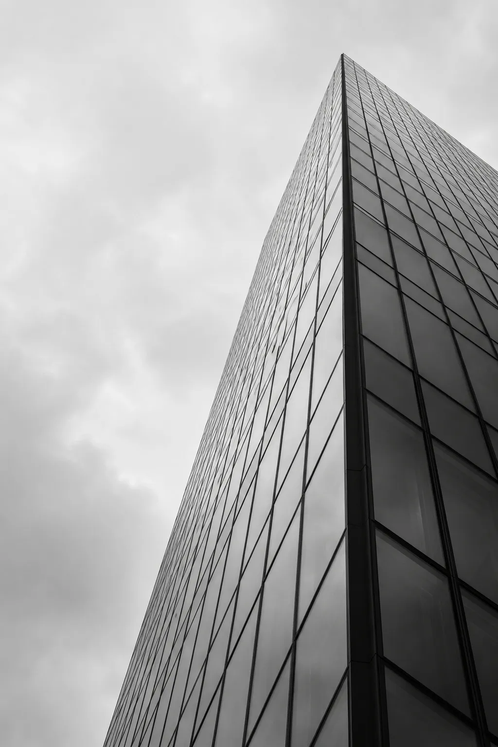 A glass tower seen from below